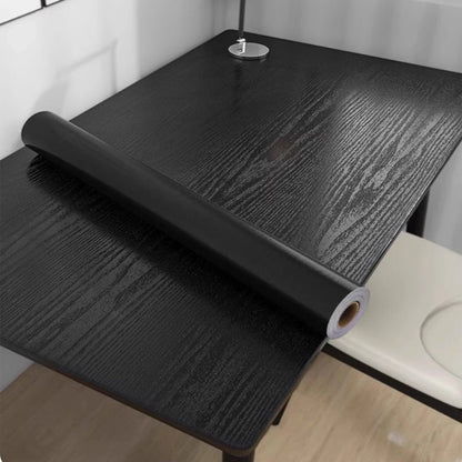URBANDESIGN – Black peel-and-stick wallpaper in wood look for modern interior upgrades 1